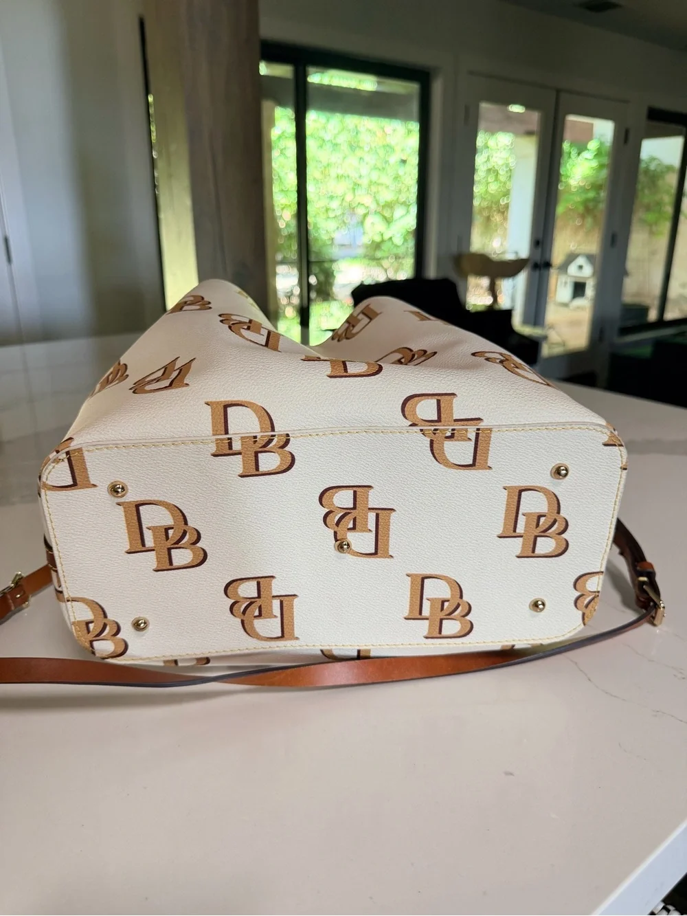 Dooney & Bourke Cream Satchel with Brown Logo Print